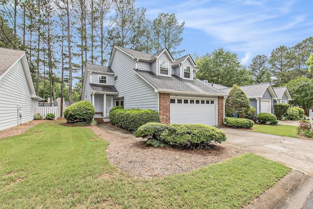 114 Emily Ln, Alpharetta, GA 30009 - view of front of home featuring brick siding, concrete driveway, a shingled roof, and an attached garage
