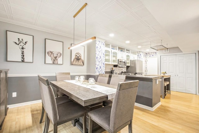 114 Emily Ln, Alpharetta, GA 30009 - dining area with recessed lighting, light wood-style floors, an ornate ceiling, and baseboards