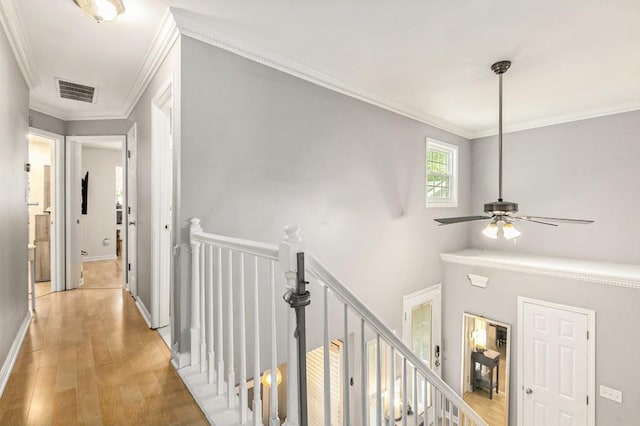 114 Emily Ln, Alpharetta, GA 30009 - hallway featuring an upstairs landing, light wood-type flooring, crown molding, and baseboards