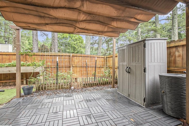 114 Emily Ln, Alpharetta, GA 30009 - fenced backyard featuring a patio and central AC unit