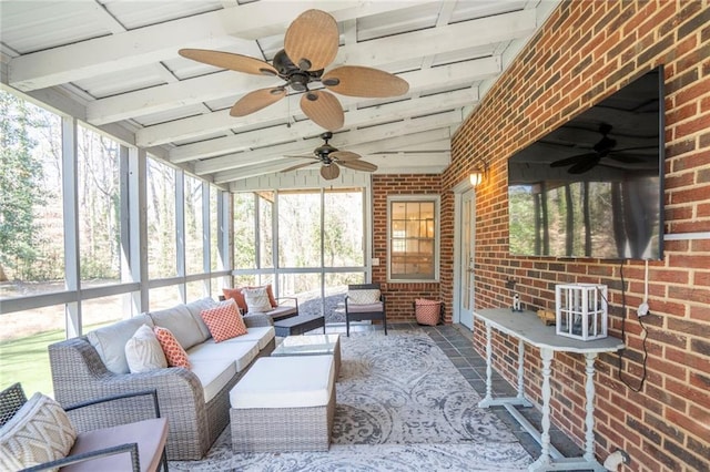 sunroom / solarium with beamed ceiling