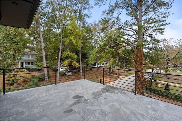 view of patio with a balcony