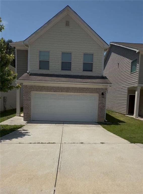 6474 Grey Fox Way, Riverdale, GA 30296 - traditional home featuring an attached garage, concrete driveway, and brick siding