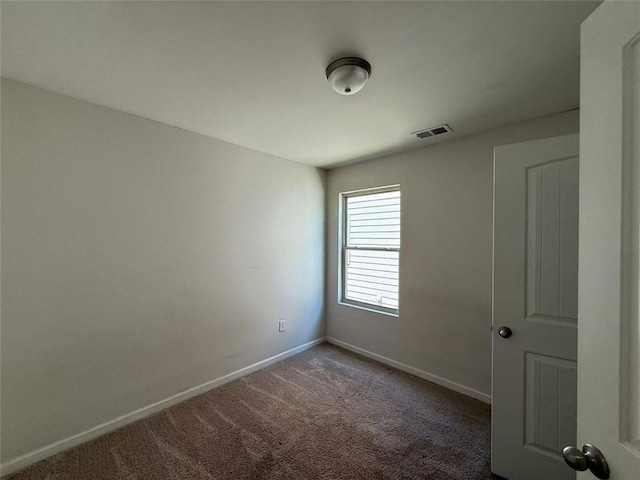 6474 Grey Fox Way, Riverdale, GA 30296 - carpeted empty room with baseboards