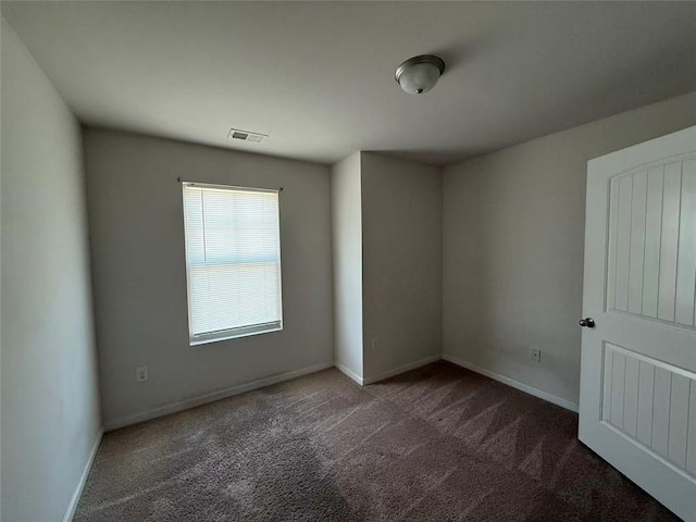 6474 Grey Fox Way, Riverdale, GA 30296 - carpeted empty room featuring baseboards