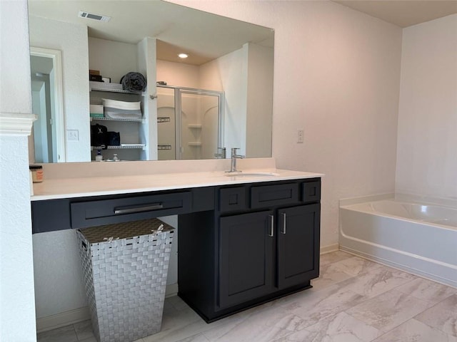 bathroom with vanity, visible vents, baseboards, and a stall shower