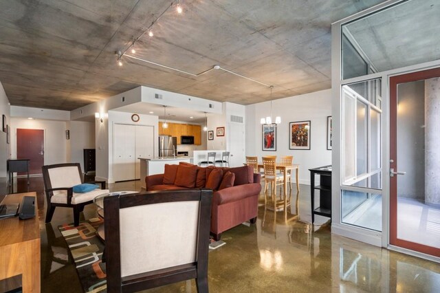 845 Spring St Unit 125, Atlanta, GA 30308 - dining room featuring a chandelier