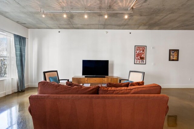 845 Spring St Unit 125, Atlanta, GA 30308 - living room with rail lighting and baseboards