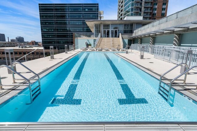845 Spring St Unit 125, Atlanta, GA 30308 - community pool with stairs and a patio area