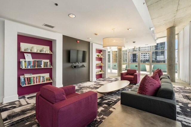 845 Spring St Unit 125, Atlanta, GA 30308 - living room featuring baseboards, expansive windows, and recessed lighting