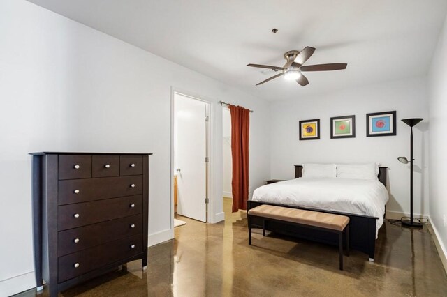 845 Spring St Unit 125, Atlanta, GA 30308 - bedroom featuring concrete flooring, baseboards, and a ceiling fan