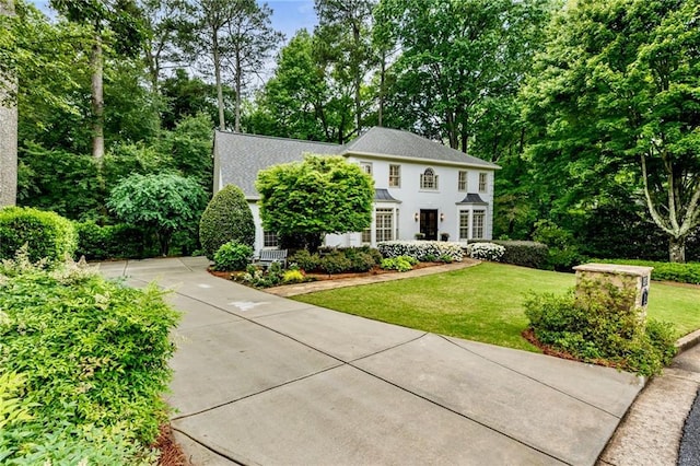 3275 Lord N Lady Ln, Alpharetta, GA 30022 - colonial inspired home featuring a front yard and concrete driveway