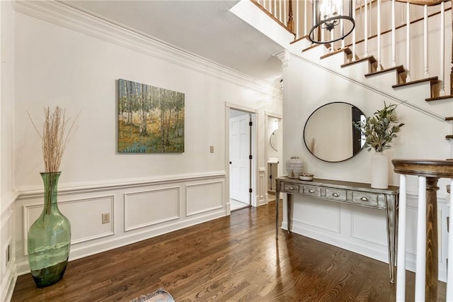 3275 Lord N Lady Ln, Alpharetta, GA 30022 - entrance foyer featuring ornamental molding, dark wood finished floors, a wainscoted wall, stairway, and a decorative wall