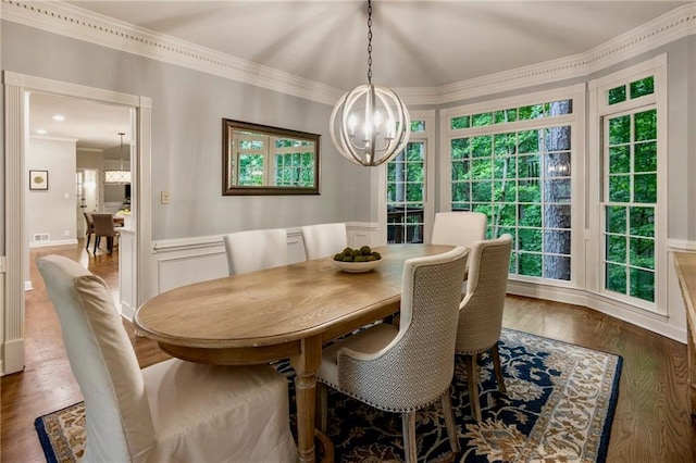 3275 Lord N Lady Ln, Alpharetta, GA 30022 - dining space featuring a chandelier, crown molding, wood finished floors, wainscoting, and a decorative wall
