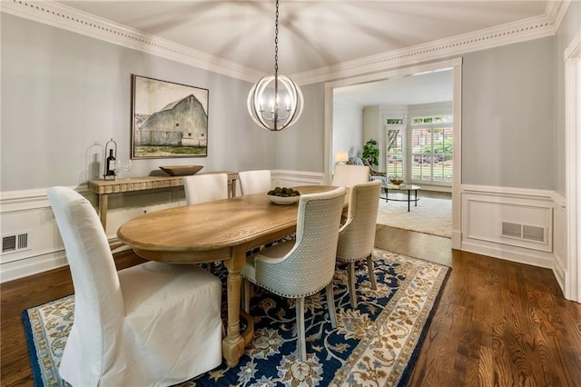 3275 Lord N Lady Ln, Alpharetta, GA 30022 - dining space with ornamental molding, wainscoting, a chandelier, dark wood-type flooring, and a decorative wall