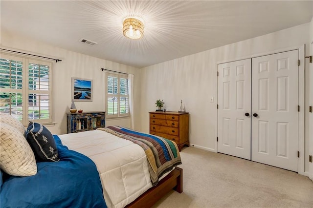 3275 Lord N Lady Ln, Alpharetta, GA 30022 - bedroom featuring light carpet, a closet, and baseboards