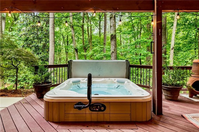 3275 Lord N Lady Ln, Alpharetta, GA 30022 - wooden deck featuring a hot tub and a wooded view