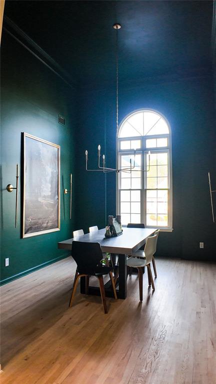 dining area with light wood-style flooring