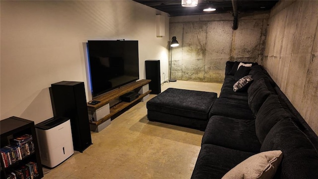 living room featuring concrete floors