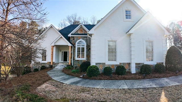 view of front of house featuring stucco siding