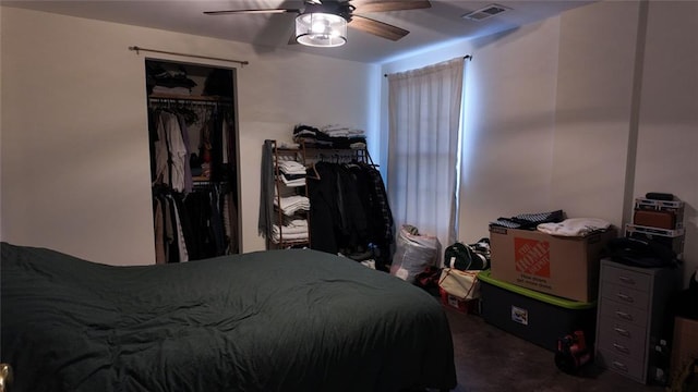 bedroom featuring a closet, visible vents, and a ceiling fan