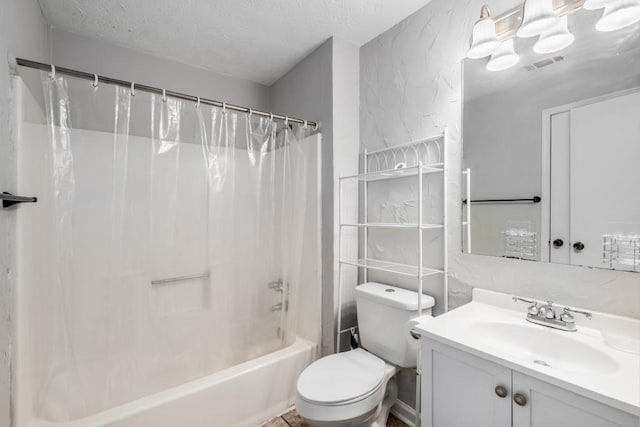 bathroom featuring vanity, visible vents, a textured ceiling, toilet, and shower / tub combo with curtain