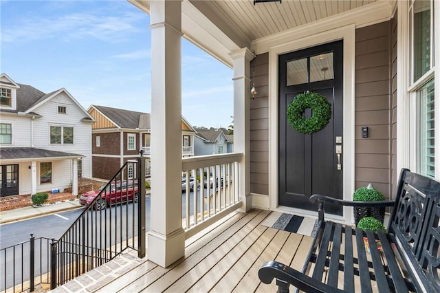 wooden deck featuring covered porch