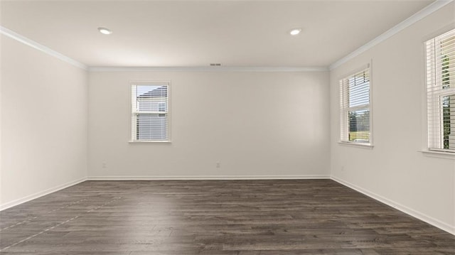 2939 Champions Way, Loganville, GA 30052 - unfurnished room with ornamental molding, healthy amount of natural light, dark wood-style floors, and recessed lighting