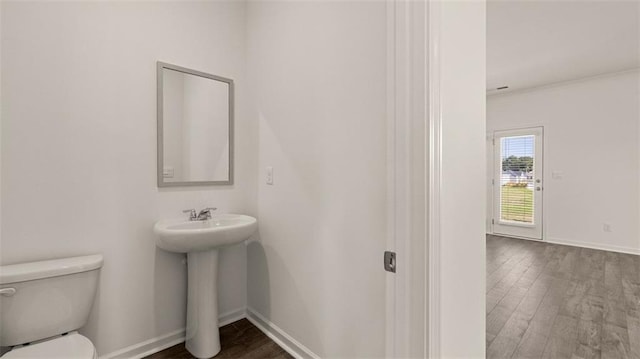 2939 Champions Way, Loganville, GA 30052 - bathroom with wood finished floors and crown molding