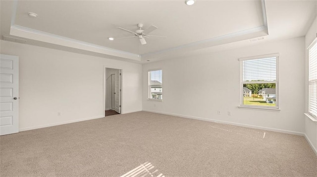 2939 Champions Way, Loganville, GA 30052 - unfurnished room featuring a tray ceiling, ceiling fan, carpet floors, and recessed lighting