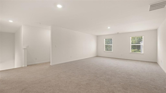 2939 Champions Way, Loganville, GA 30052 - unfurnished room with light carpet and recessed lighting