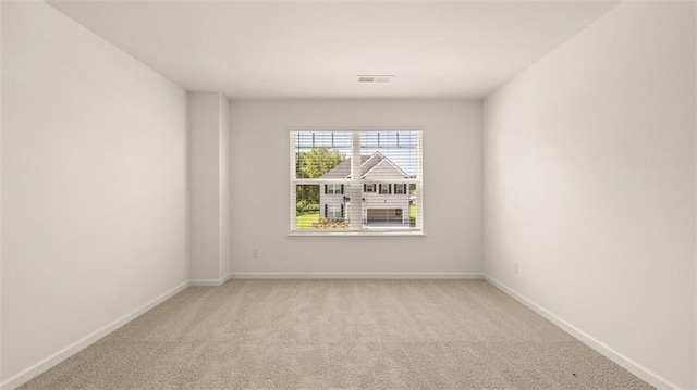2939 Champions Way, Loganville, GA 30052 - unfurnished room featuring light colored carpet and baseboards