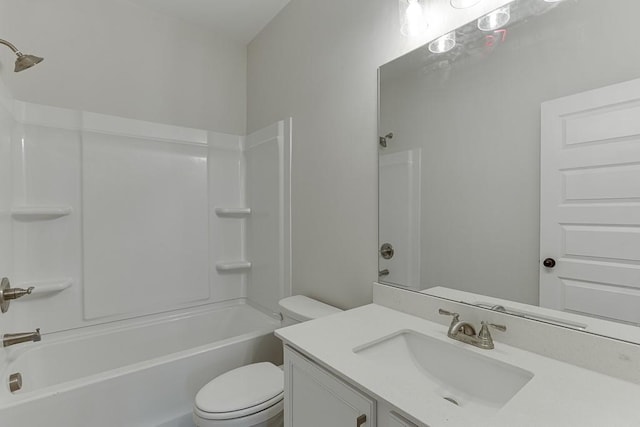 full bathroom with shower / bathing tub combination, vanity, and toilet