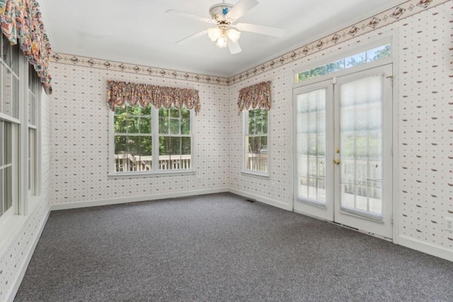 3175 Lake Seminole Pl, Buford, GA 30519 - unfurnished sunroom featuring carpet floors, wallpapered walls, baseboards, and plenty of natural light