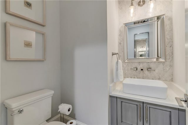 half bath with toilet and vanity