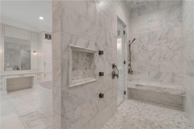 full bath featuring a stall shower, a soaking tub, vanity, and recessed lighting
