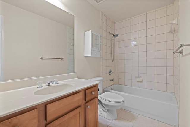 full bath with toilet, shower / bathtub combination, tile patterned flooring, and vanity