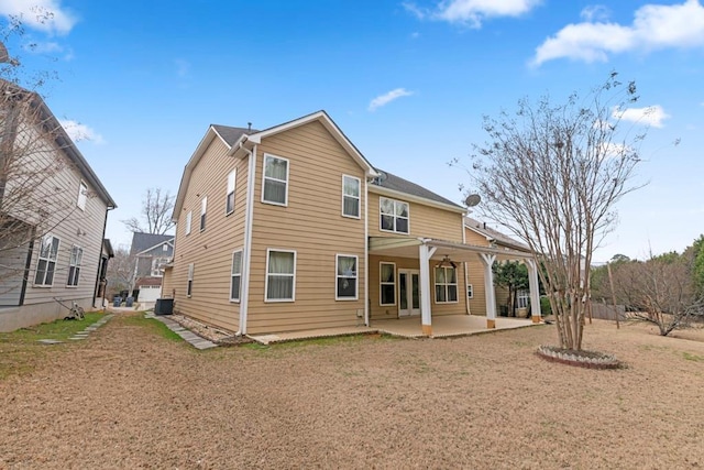 back of property featuring a patio area and cooling unit