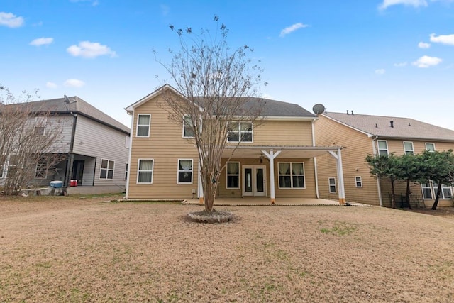 back of property featuring a patio area