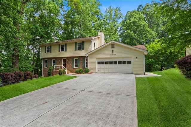 3802 SW Knights Bridge Rd SW, Lilburn, GA 30047 - view of front facade featuring a garage, concrete driveway, a chimney, brick siding, and a front yard