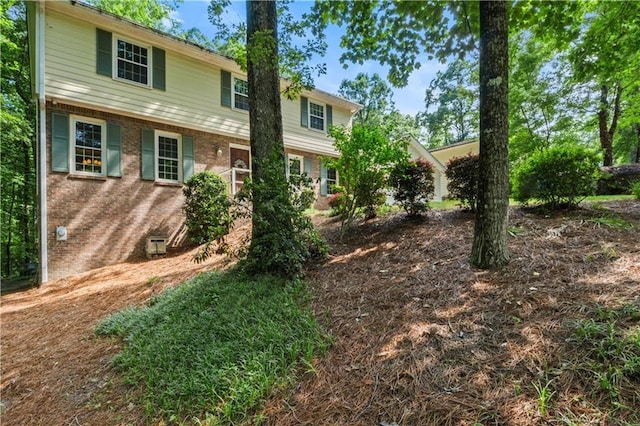 3802 SW Knights Bridge Rd SW, Lilburn, GA 30047 - view of front of property featuring brick siding