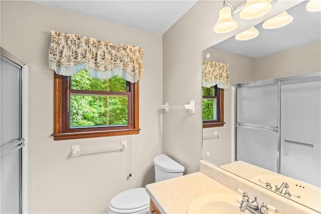 3802 SW Knights Bridge Rd SW, Lilburn, GA 30047 - full bath with plenty of natural light, vanity, a shower with door, and toilet