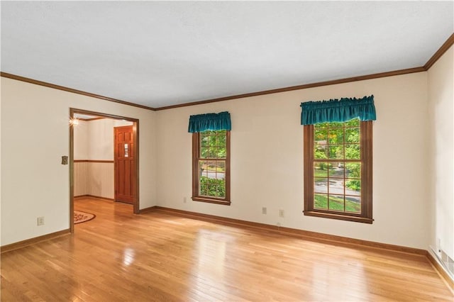 3802 SW Knights Bridge Rd SW, Lilburn, GA 30047 - unfurnished room featuring crown molding, light wood-style floors, and baseboards