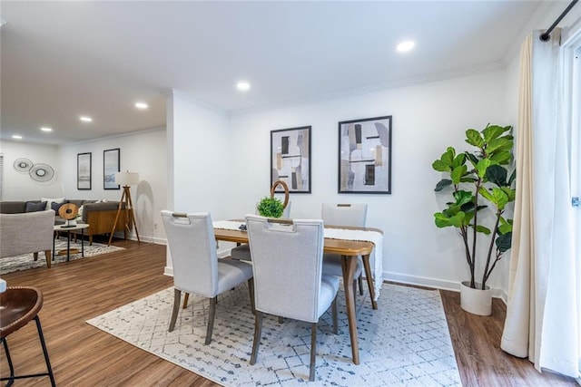 115 Biscayne Dr NW Unit F10, Atlanta, GA 30309 - dining area featuring ornamental molding, baseboards, wood finished floors, and recessed lighting