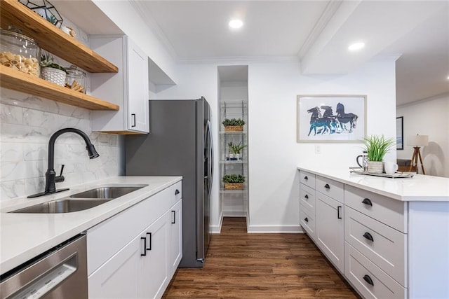 115 Biscayne Dr NW Unit F10, Atlanta, GA 30309 - kitchen featuring a sink, stainless steel appliances, a peninsula, recessed lighting, and decorative backsplash
