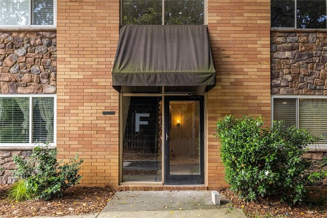 115 Biscayne Dr NW Unit F10, Atlanta, GA 30309 - property entrance with brick siding