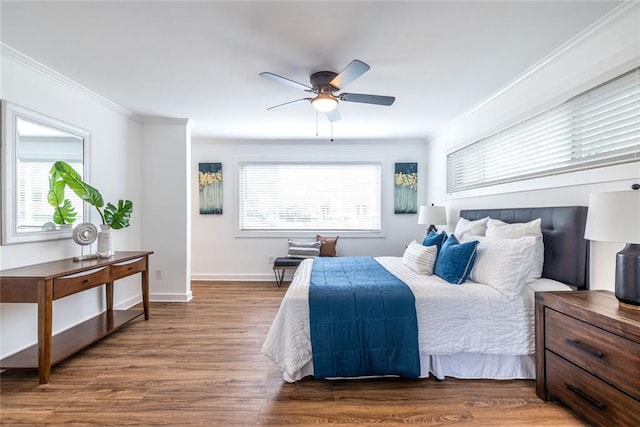 115 Biscayne Dr NW Unit F10, Atlanta, GA 30309 - bedroom featuring multiple windows, wood finished floors, ornamental molding, baseboards, and a ceiling fan