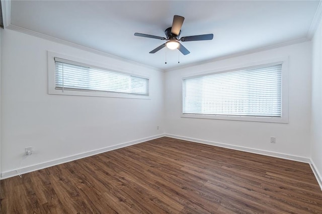 115 Biscayne Dr NW Unit F10, Atlanta, GA 30309 - spare room with crown molding, dark wood-style floors, baseboards, and a ceiling fan