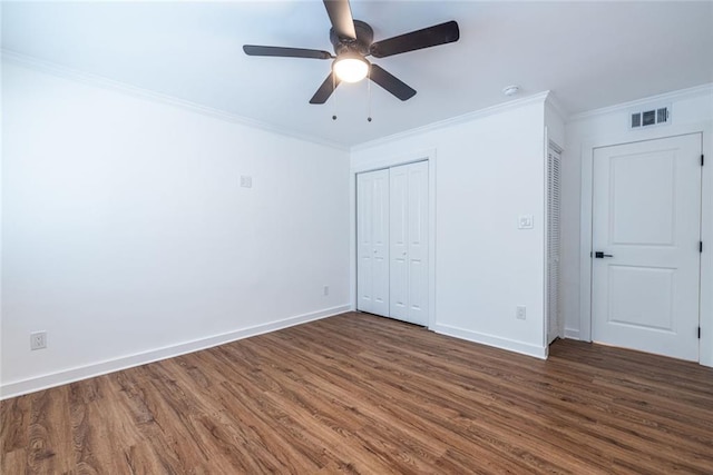 115 Biscayne Dr NW Unit F10, Atlanta, GA 30309 - unfurnished bedroom featuring wood finished floors, ornamental molding, baseboards, and ceiling fan