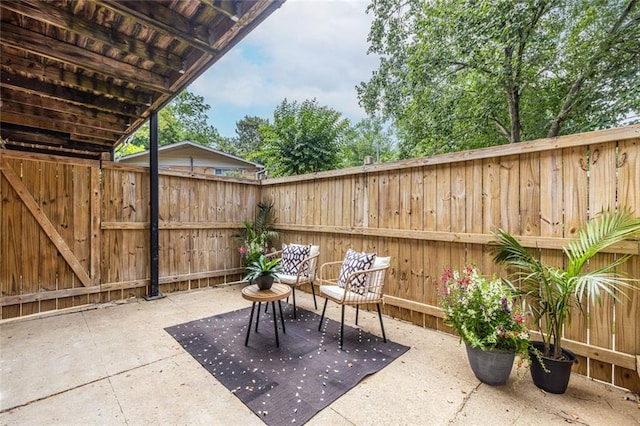 115 Biscayne Dr NW Unit F10, Atlanta, GA 30309 - fenced backyard with a patio